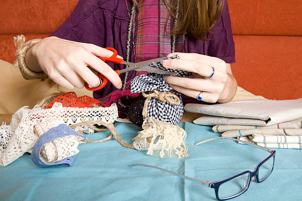 A young girl handcrafting ornaments as part of the best upcycling ideas