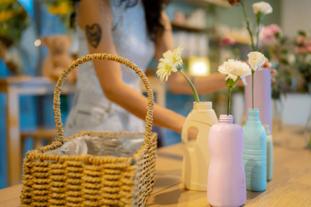 Florist's owner decorated the shop with plastic flower vases through upcycling and recycling.
