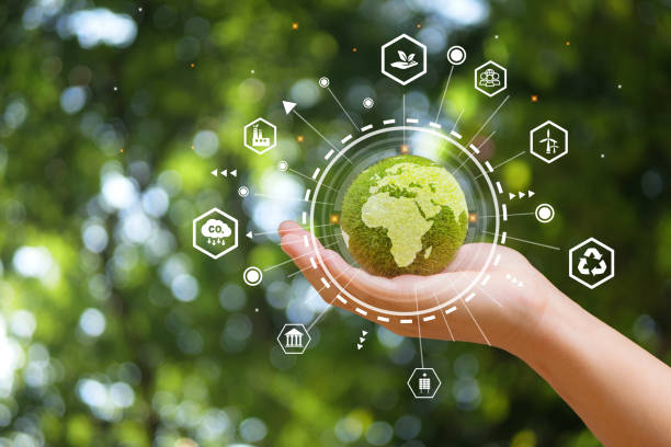 Hand of human holding green earth with the icon of Environment for ESG, co2, and net zero. Zero-Waste Technology: Innovations for E-Waste Reduction and Recycling